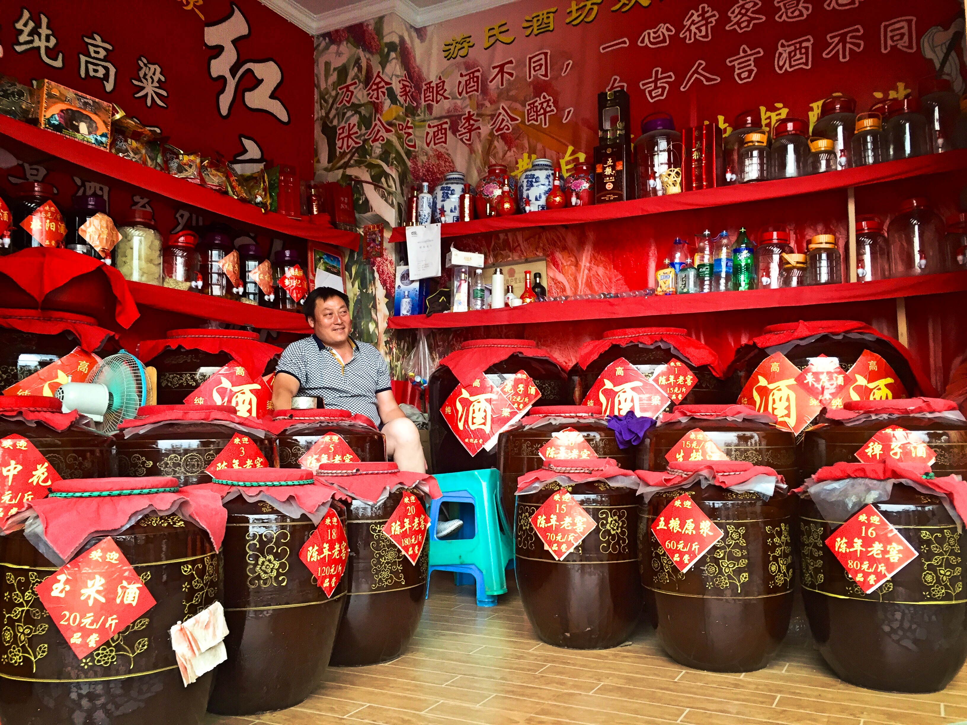 Chinese villagers leave liquor to purify inside bamboo to make alcohol